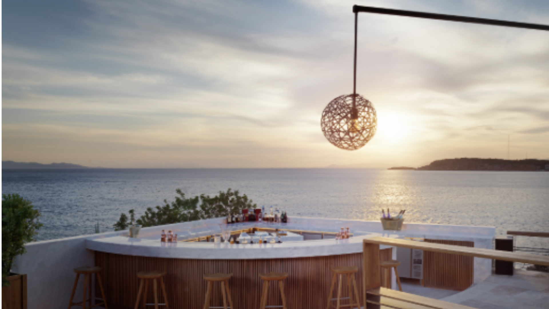 Sunset over the Saronic Gulf from Matsuhisa Athens at the Four Seasons Astir Palace on the Athens Riviera, where the PJ Kabos family gathers each June with Chef Nobu Matsuhisa.