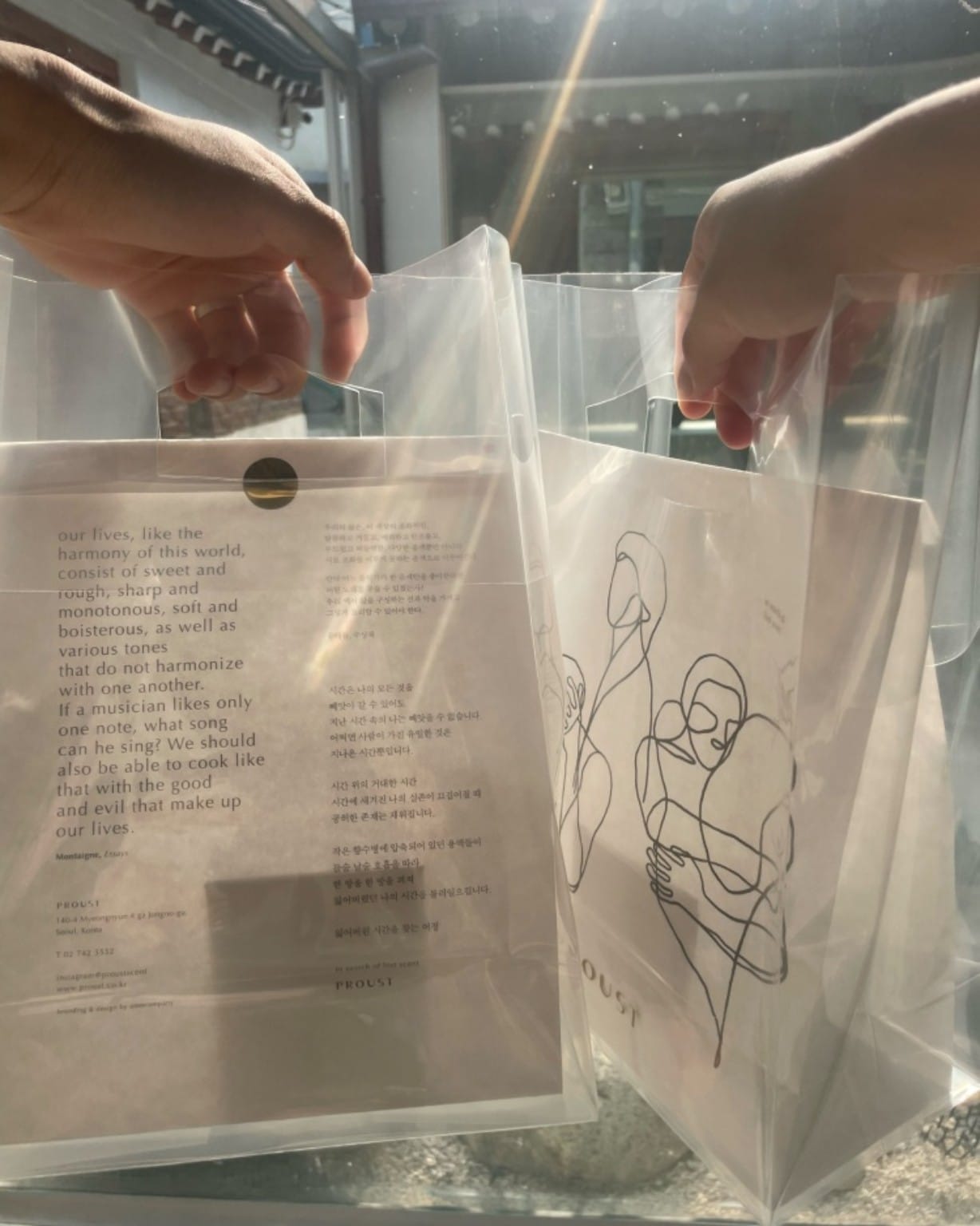 PROUST bags with literary text and line art in the sunlight at the hanok atelier