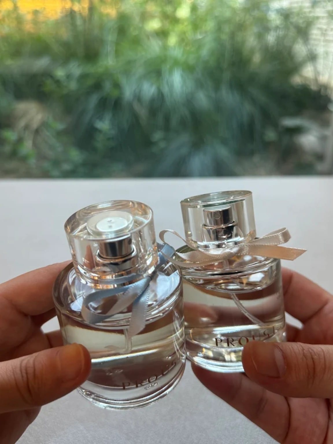 Personal perfumes with blue and beige ribbons at PROUST Seoul