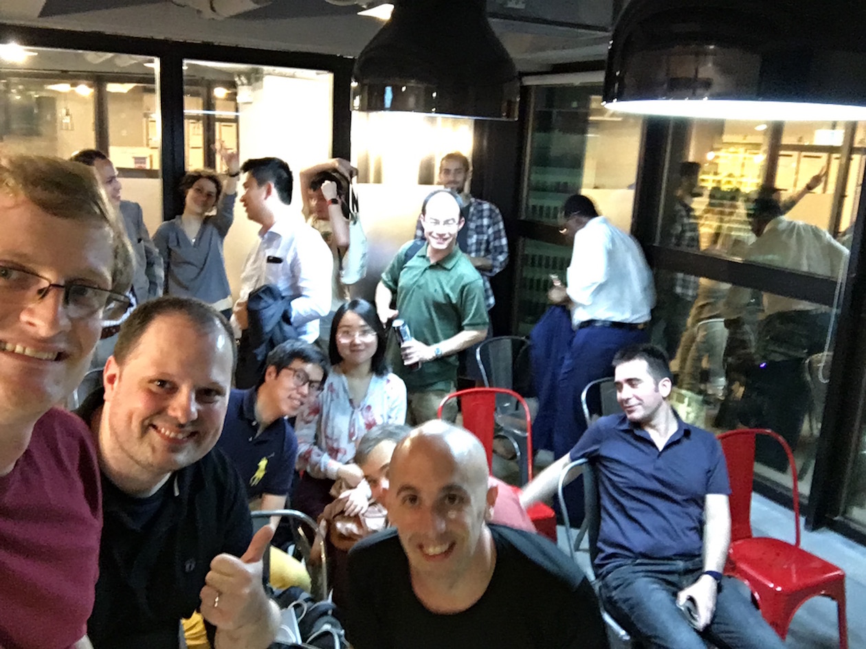 Speakers Filipe, Larry, and Leo take a selfie.