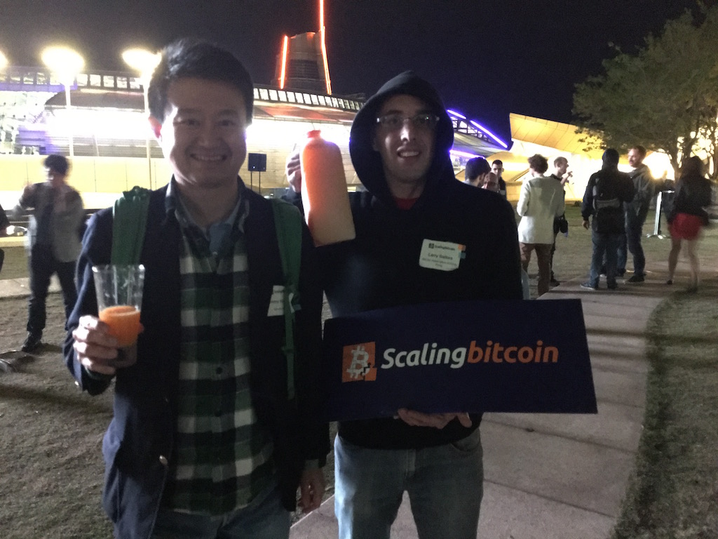 Larry and Jimmy pose with the Block and some orange juice