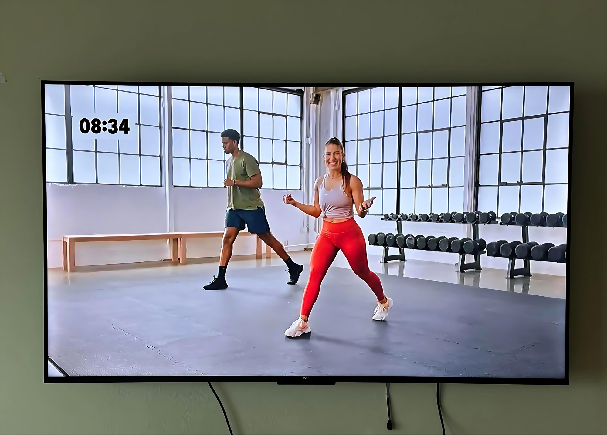 Two gym trainers conducting a 10 minute workout session