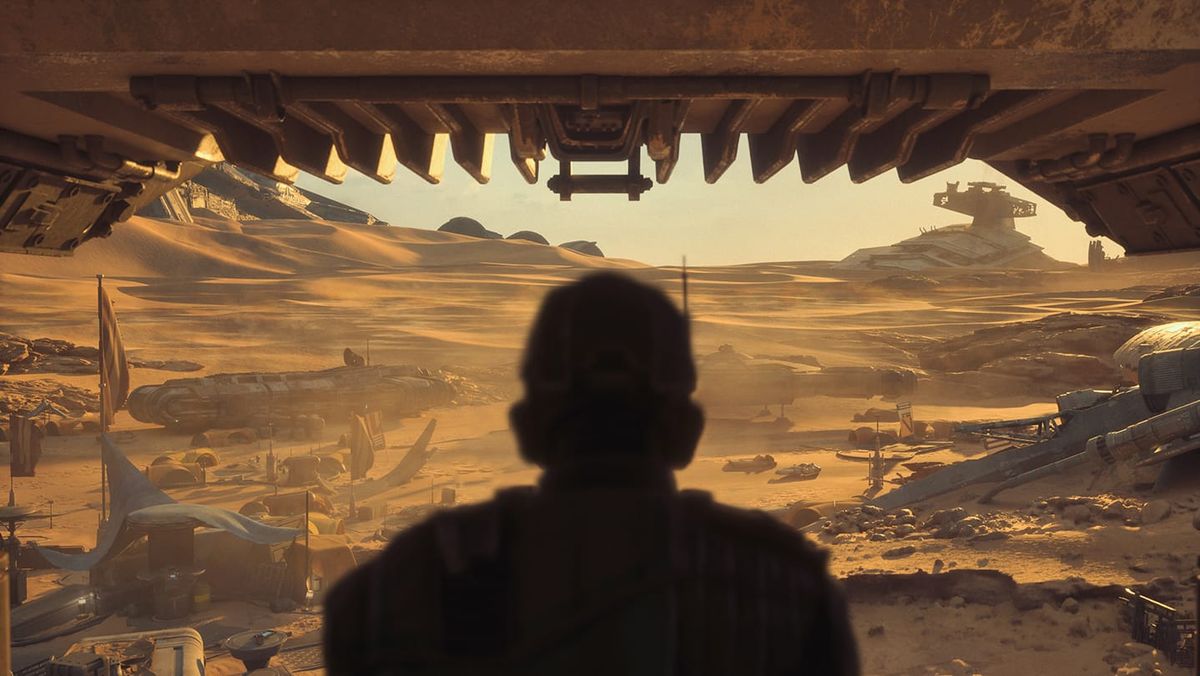 Silueta postavy pod skalním převisem hledí na pouštní planetu s vraky lodí ve hře Star Wars: Galactic Racer