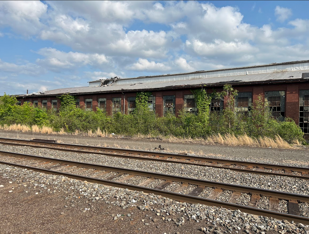 Former Hercules plant building across from the rail stop