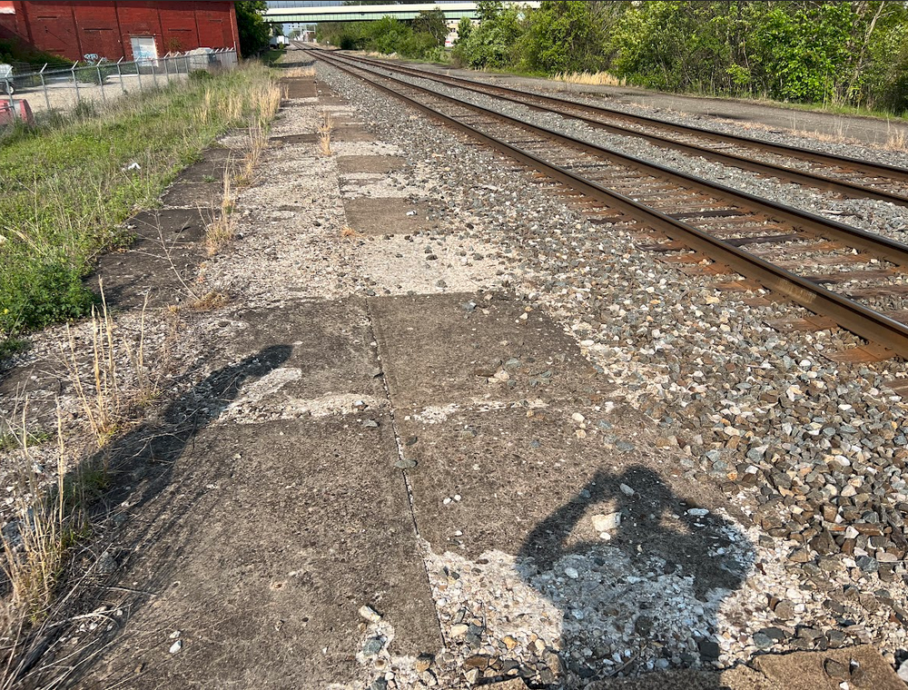 Concrete Slab beside double tracked rail.