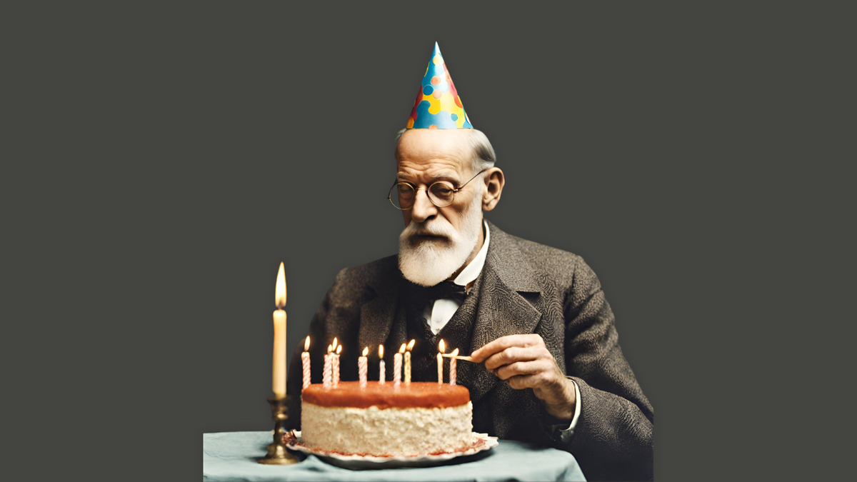 AI-generated image of Freud wearing a birthday hat and blowing candles off his birthday cake