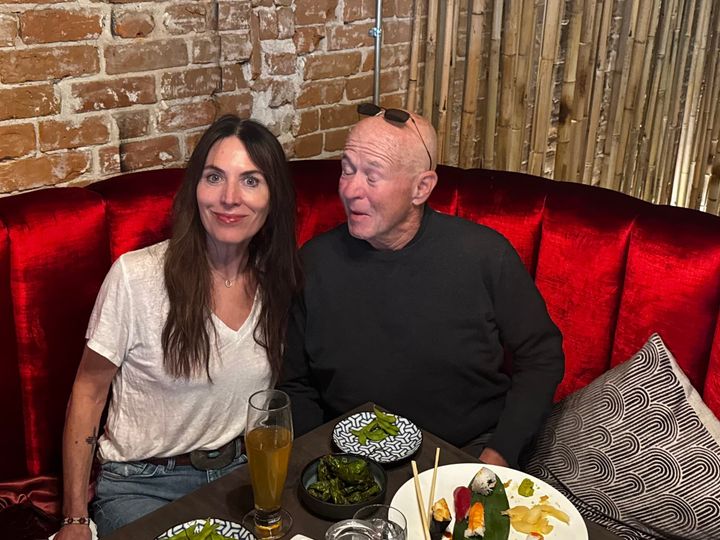 David Granger, Amy Cosper, a pile of raw fish and some edamame. The red velvet couch makes us look glamorous.