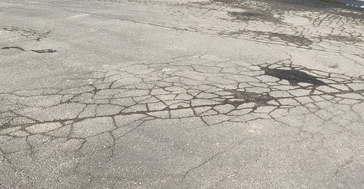 A look at cracks in the road in Stamford. (Photo by Kelly Prinz)