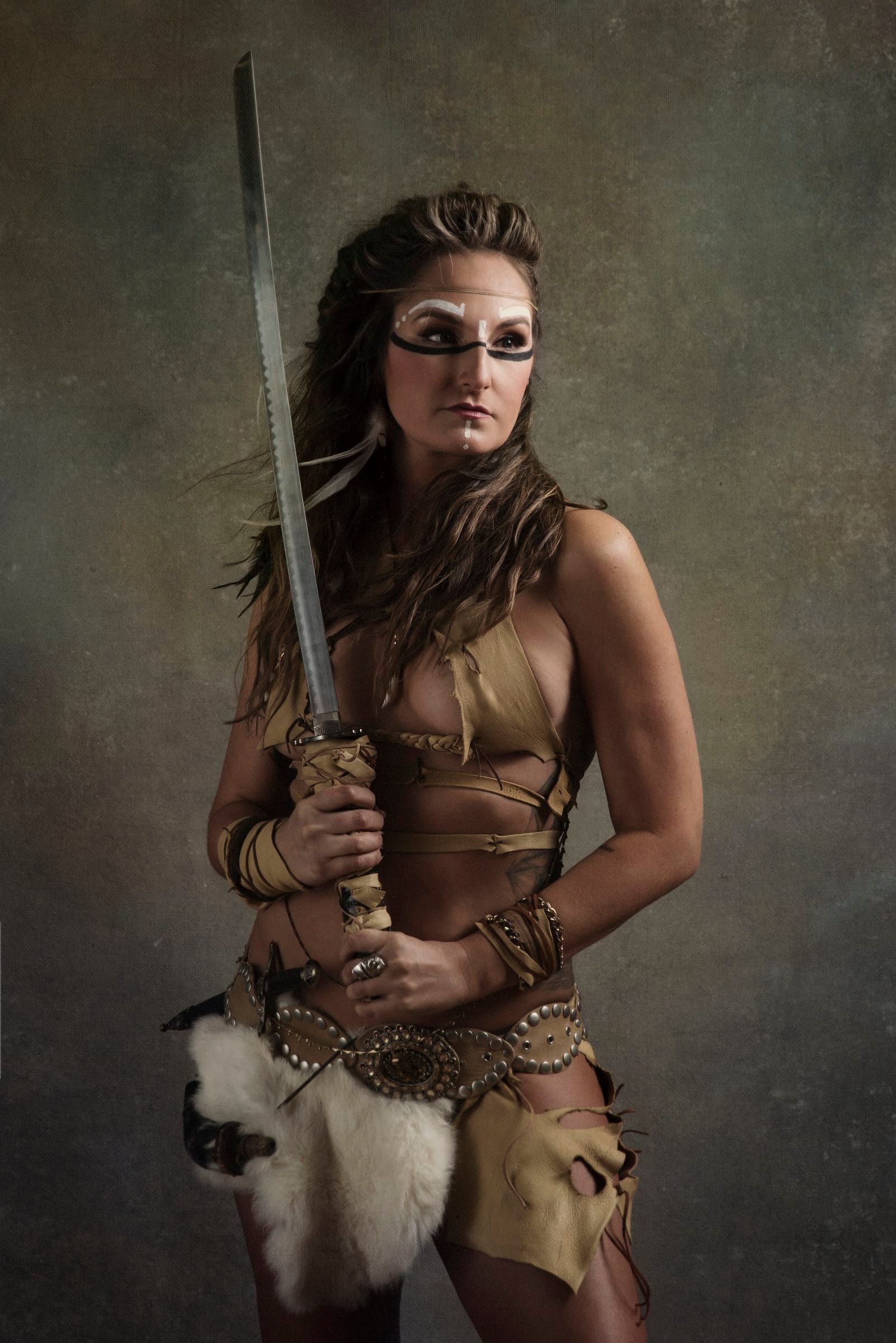 Fine art warrior portrait with a sword