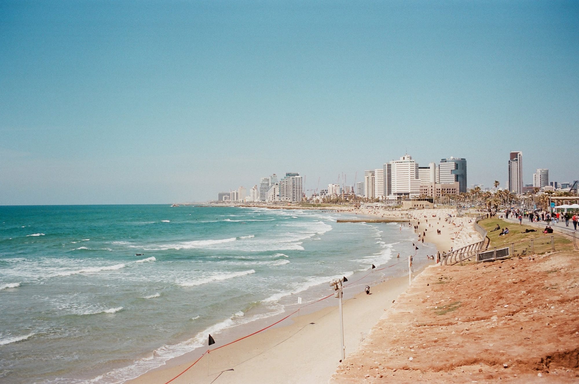 Turquoise surf and the Tel Aviv skyline