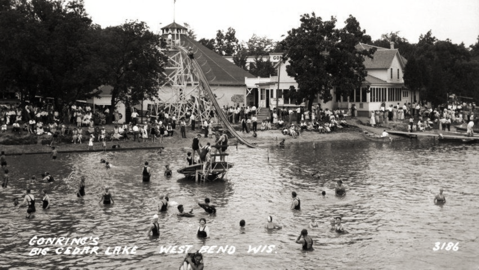 Water slide and beach on historic Big Cedar Lake in West Bend, Wisconsin