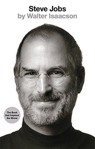Book cover of Steve Jobs by Walter Isaacson with a portrait of Steve Jobs wearing round glasses and a light smile. 