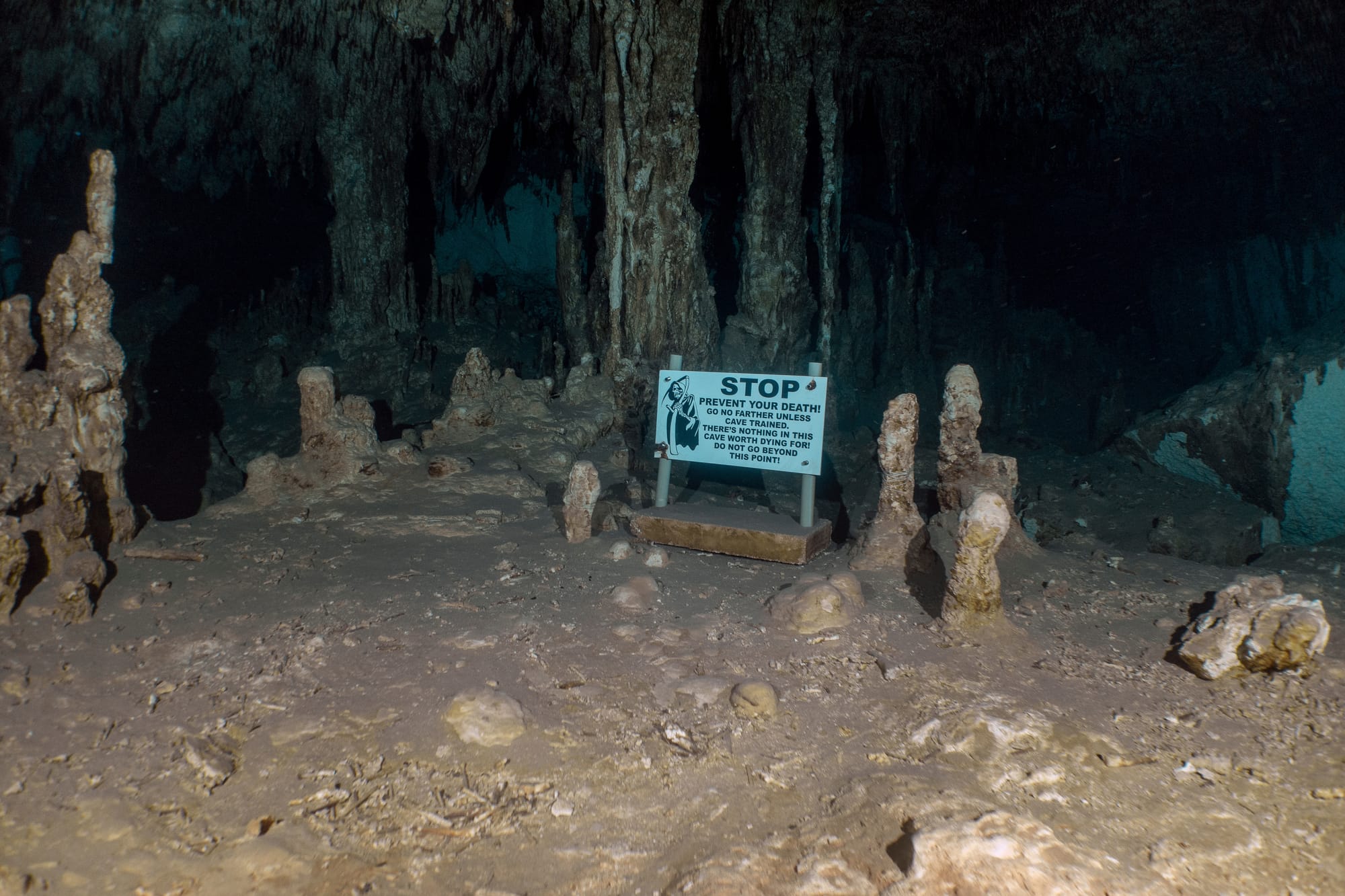 The grim reaper sign to deter any non-cave divers from going further