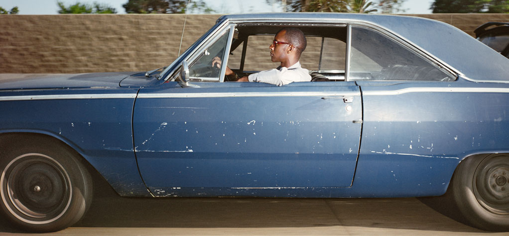 Man continuing east at 67 mph on Interstate 10 near Palms Boulevard in Los Angeles at 
4:14 p.m. in February 1991 
From the series Vector Portraits 
Digital C-Print  
© Andrew Bush, Courtesy Yossi Milo Gallery, New York and Julie Saul Gallery, New York 