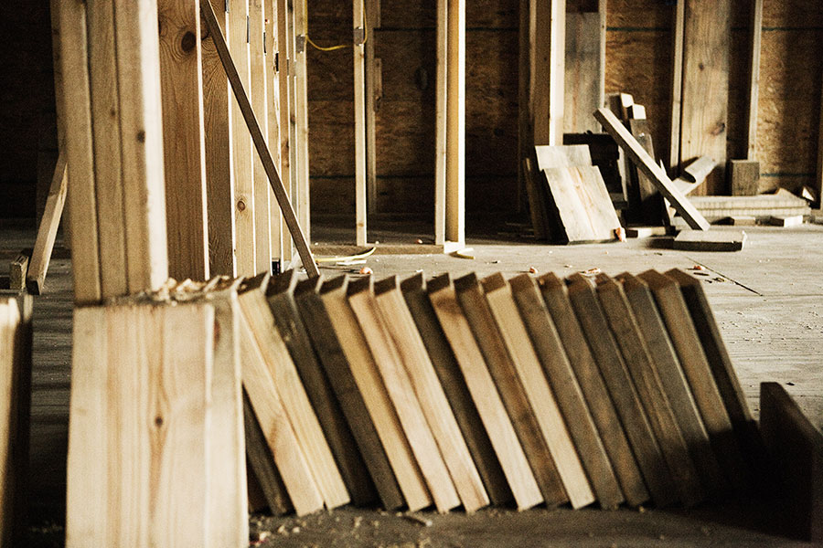 This new home is raised more than 12 feet off the ground and the walls are over 10 feet high. Building code dictates that when your walls are over 10 feet high, you have to install fire blocking—pieces of wood that run perpendicular to the frame—so that the wood will stop the fire from rapidly spreading right up the walls and to the roof.<br /><br />
The build is being funded by a Louisiana Housing Finance Agency grant. The money is difficult to use because the building specifications are strict and there are eagle-eye inspections at various stages of building.