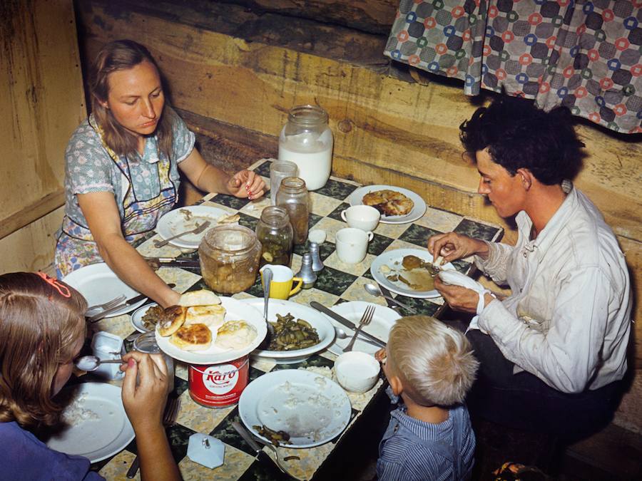 The Fae and Doris Caudill family eating dinner in their dugout, 2010
10 1/2 x 14