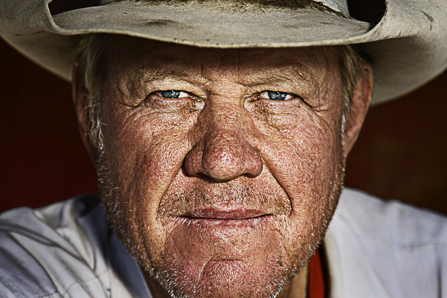 DEWAYNE JUSTICE, citrus and livestock, Waddell, Arizona<br /><br />
“Neither of my parents went to college, but they were both readers. I don’t think a night went by when my mom didn’t read to us kids from the time we were little bitty. She’d bring home books from the library. This was before the age of television and there weren’t a whole lot of other things to do. I still love to read. I usually have about four books on my bedside table going at once. But with farming, you can’t get it out of a book. And you can’t get it off of a movie. You have to be there, you have to feel it. You can always judge by a man’s hands whether he makes his living off the land. There was an old gentleman who worked for me, and he never wore gloves. And when you shook hands with him it was like shaking hands with an old saddle.”