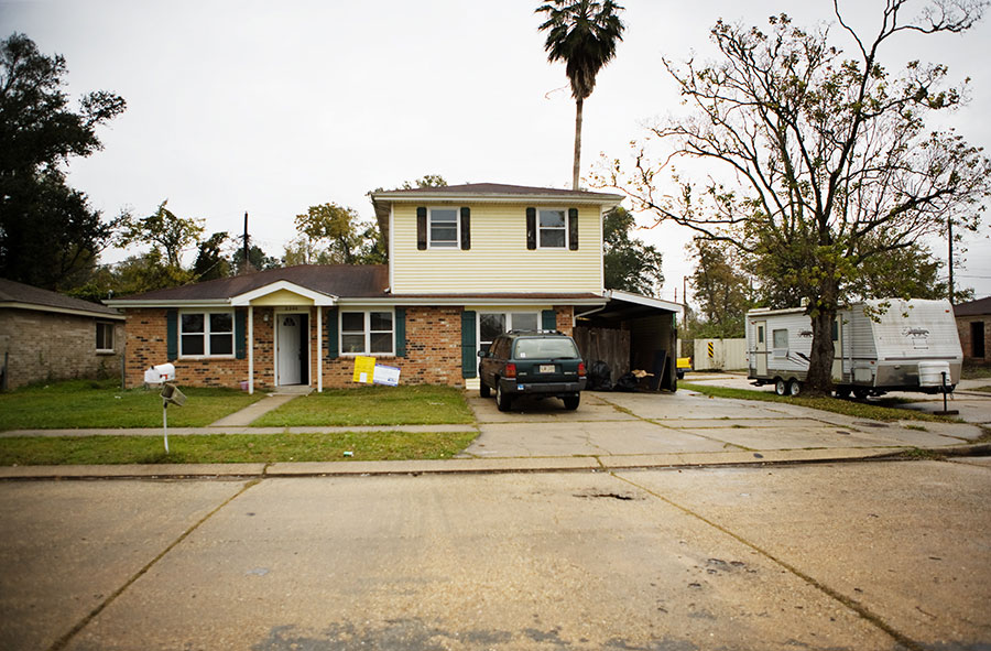 Some houses just glow; this one beams. At the time we shot this home, the owner had already started to pile boxes in the bedrooms. The St. Bernard Project has rebuilt this house from “mold up,” Justine says.