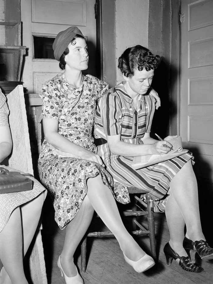 Couple at community meeting, 2010. 10 1/2 x 14