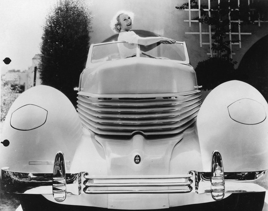 For its publicity campaign, the Cord Corporation enlisted Norwegian figure skater Sonja Henie, who won gold medals in the 1928, 1932, and 1936 Winter Olympics, to pose with the 1936 Cord 810.