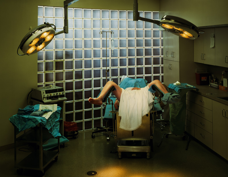 Hymenoplasty, Cosmetic Surgery, P.A.<br>Fort Lauderdale, Fla.<br /><br />
The patient in this photograph is 21 years old. She is of Palestinian descent and living in the United States. In order to adhere to cultural and familial expectations regarding her virginity and marriage, she underwent hymenoplasty. Without it she feared she would be rejected by her future husband and bring shame upon her family. She flew in secret to Florida where the operation was performed by Dr. Bernard Stern, a plastic surgeon she located on the internet.<br /><br />
The purpose of hymenoplasty is to reconstruct a ruptured hymen, the membrane which partially covers the opening of the vagina. It is an outpatient procedure which takes approximately 30 minutes and can be done under local or intravenous anesthesia. Dr. Stern charges $3,500 for hymenoplasty. He also performs labiaplasty and vaginal rejuvenation.