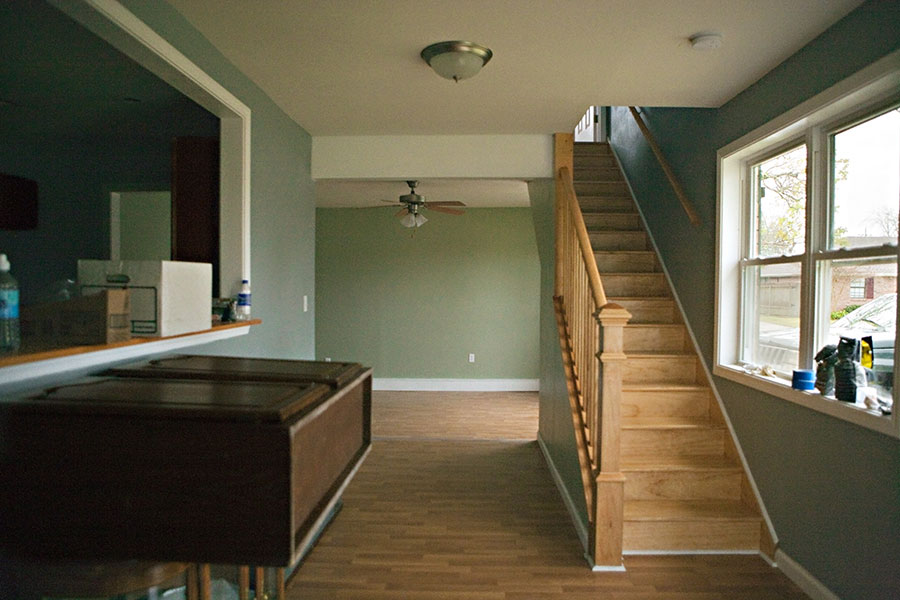 After years of steady core volunteer work with the St. Bernard Project, Church of the Brethren have become partners in rebuilding. Crews come down with regularity, often boasting professional carpenters and skilled tradesmen. One member makes banisters for a living and tricked out this one on the interior stairs. “They’re so motivated and they love to work” Justine tells me. “It’s inspiring to our site supervisors.”<br /><br />
One challenge that rebuild non-profits face is restoring the unique, original attributes of a building within a budget. Many homeowners remember the construction and look of their houses down to the location of each light switch. They know which way the doors used to swing open and the exact tint of the wallpaper. But raised foundations, mold remediation, termite contracts, and energy-efficient windows are costly, and they’re often prioritized above brightly colored paint jobs and antique tile floors. Homeowners often foot the bill and do the work themselves for custom details, but more often than not rebuilds look a little more Home Depot and a little less Craftsman.