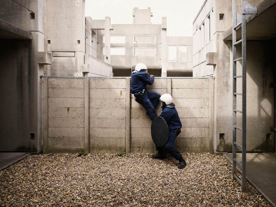 Police Academy No.1 Ossendrecht—N-Brabant, May 25, 2009. The Riot Police during individual training. By using proper climbing techniques the Riot Police learn how to move inconspicuously, tactically, and safely.
