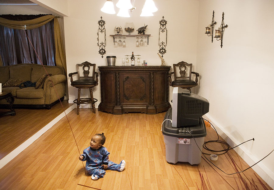 Because of her warmth and spirit, Lynette Harvey became the face of the St. Bernard Project’s <i>Color Purple</i>-funded rebuild efforts, and the cast and crew even came to help move furniture into her home. She wasn’t expecting visitors or cameras that day so we stuck to photographing the finished home and “Baby Frank.”