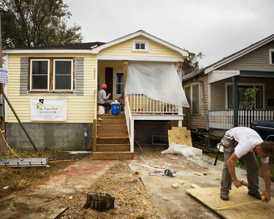 The day after Justine shows us around the houses being rebuilt by the St. Bernard Project, Cambria Martinelli, the AmeriCorps Program Manager at Rebuilding Together New Orleans—another rebuilding non-profit that restores homes damaged by Hurricane Katrina—takes us to a home being worked on by her organization.<br /><br />
This home in Hollygrove was gutted down to the studs after the storm. The siding is cedar, and Rebuilding Together has patched it around the window with HardiPlank, a cement and wood composite ubiquitous in New Orleans construction.