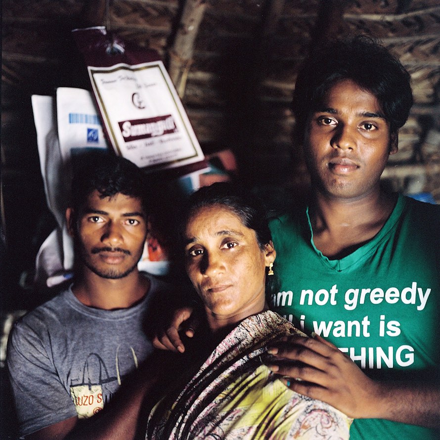 Lakshaya (far right) poses with her mother and brother in their house in Devenappatinam.
Laksheaya’s family are very supportive of her kothi identity. Her brother often hangs out with her kothi friends Mohana and Laksheaya, who are best friends and confidantes. November 2013.