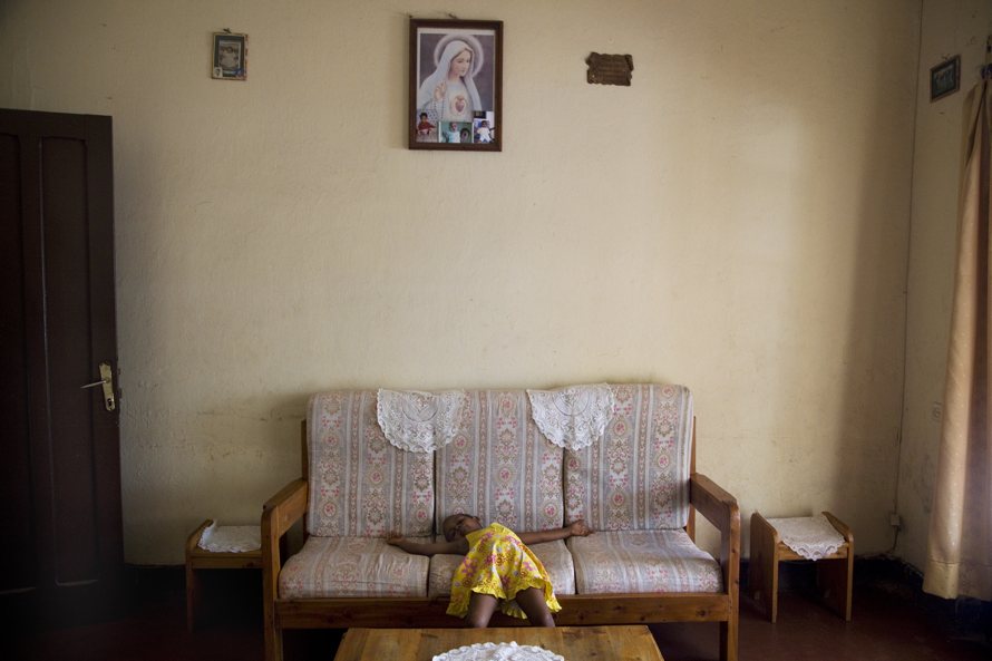 Koky’s youngest daughter Isaora in the living room.