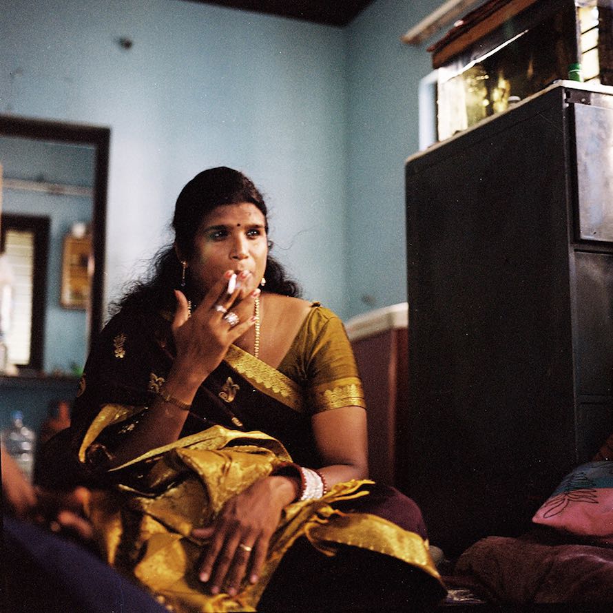 Sheethal smokes a cigarette in her apartment in Pondicherry. Sheethal acts as a guru to many of the younger kothis in this community who refer to her as their mother and she to them as her daughters. March 2013.