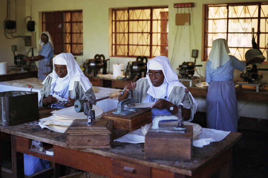 Nuns in the convent of the ‘Visitandines’ in Gitega. They are busy producing handmade hosts.  