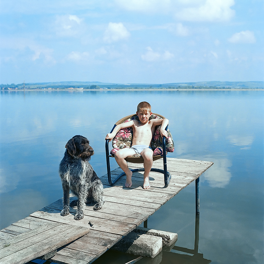 © Evžen Sobek, <em>Untitled (Boy With Dog)</em>, 2008. Courtesy of ClampArt, New York City.