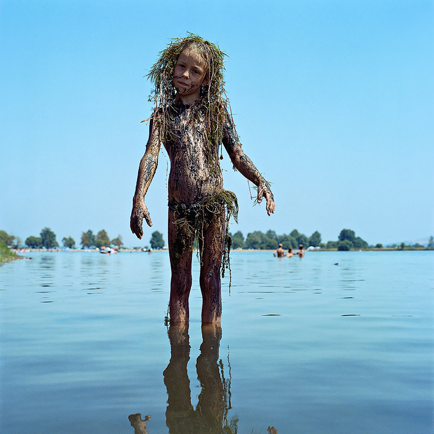 © Evžen Sobek, <em>Untitled (Girl Covered With Grass)</em>, 2007. Courtesy of ClampArt, New York City.