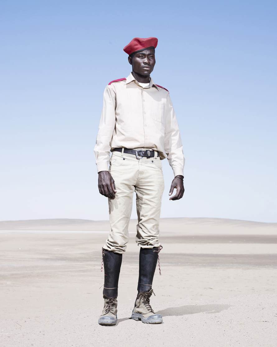 “Herero Soldier in Red Beret” (2012) © Jim Naughten, Image courtesy of Klompching Gallery, New York City