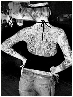 This woman has ink over 80% of her body.