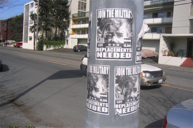 <b>Replacements Needed</b><br />These “Replacements Needed” fliers are plastered all over Seattle—from the University District in the North all the way to Georgetown in the South—and apparently they’ve all been put up by a single man, a modern-day pamphleteer who updates the posters weekly with the revised casualty count. <br /><br />
No one seems to know who he is, but I actually saw him once. A somewhat disheveled youth carrying a roll of packing tape in one hand and a tote bag in the other passed me on a back street of Capitol Hill. When I looked over my shoulder a few paces later, I saw him pull several of these signs out of his bag, affix them to a lamppost with lightning speed, and continue on down the street as casual as could be.<br /><br />Mileage: 4.5 of 6.0
