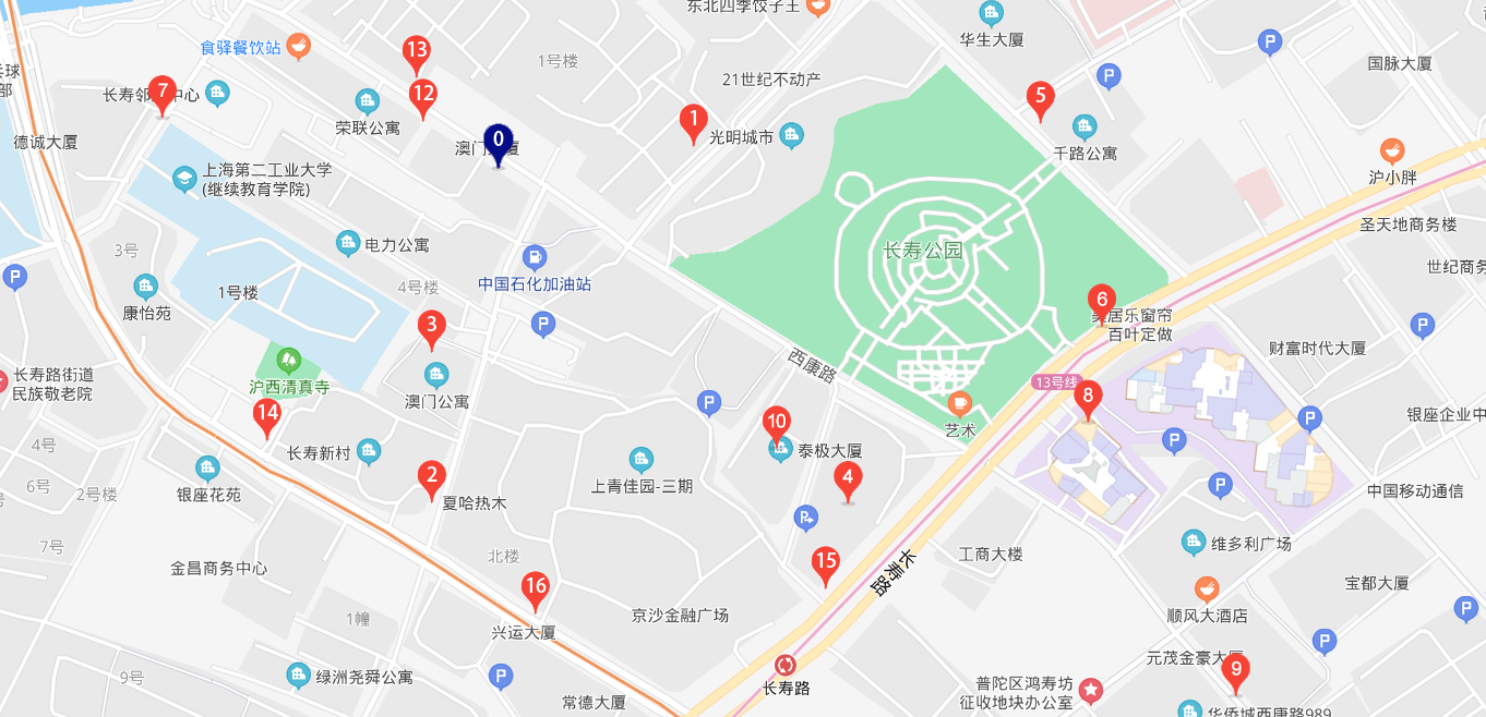 A map of a neighborhood in a city, showing various numbered red and blue markers representing delivery points. The markers are scattered across streets and near a green park area in the cente