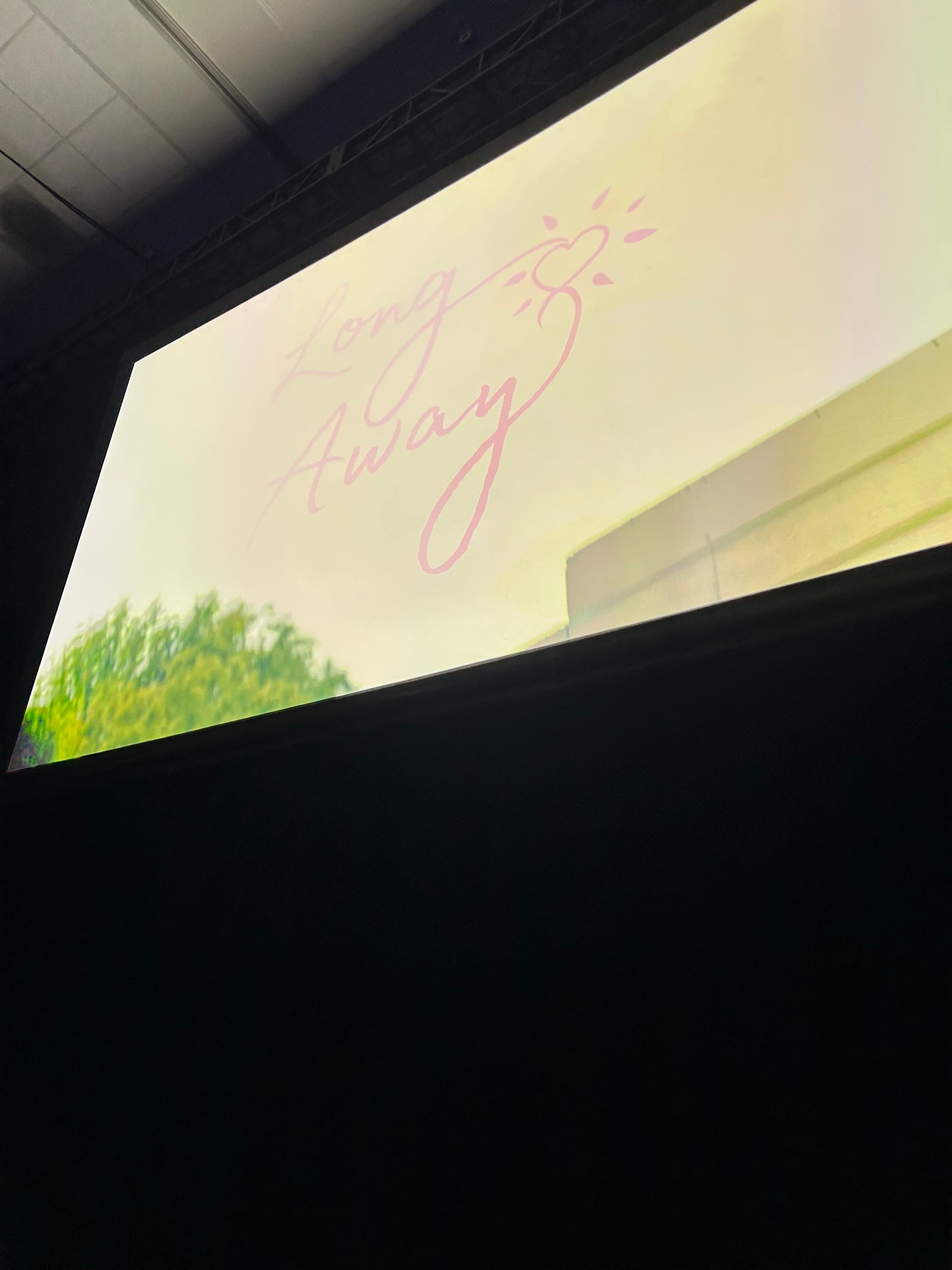 The Long Away film opening on a large screen directly above us