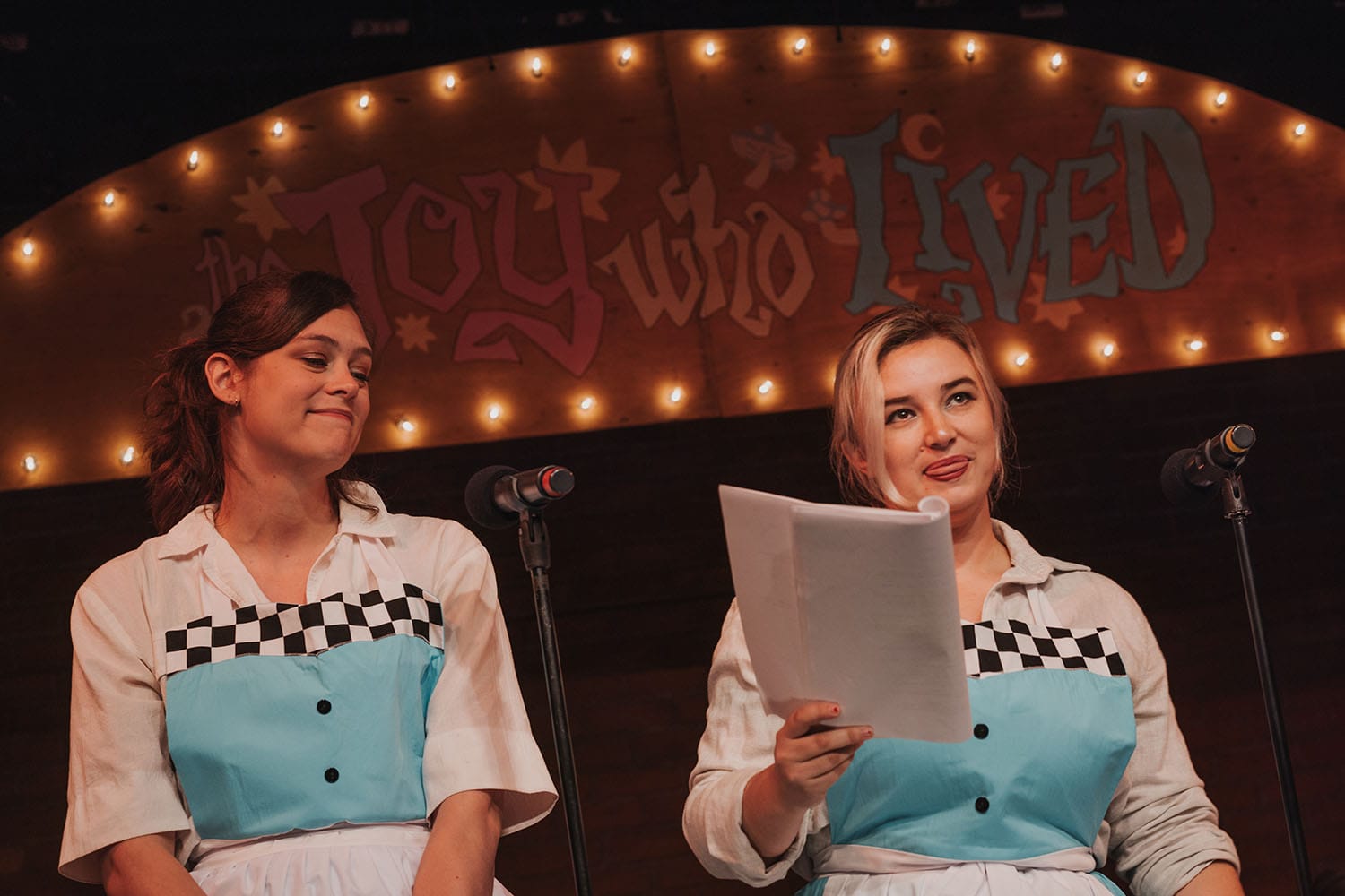 Griffin Kelly as Harper next to Jacks McLaughlin as Anika