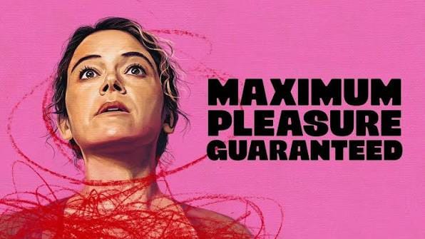 Maximum Pleasure Guaranteed key art, showing Tatiana Maslany looking up in shock, and covered in red pencil editorial circles, on a pink background.