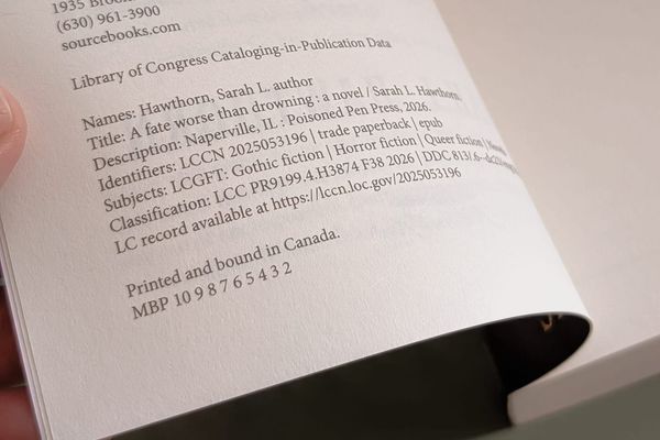 The front matter page of A FATE WORSE THAN DROWNING, featuring the printer's key with a countdown from 10 to 2, showing it's the 2nd printing.