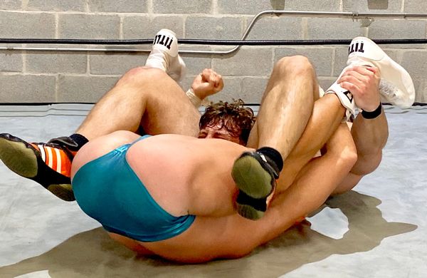 Hit the mat with Muscleboy Wrestling