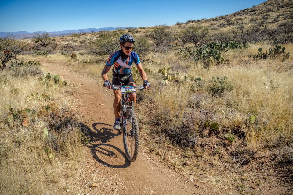 Kyle Kwiedacz on a mountain bike riding a section of single track during the 24 House in the Old Pueblo