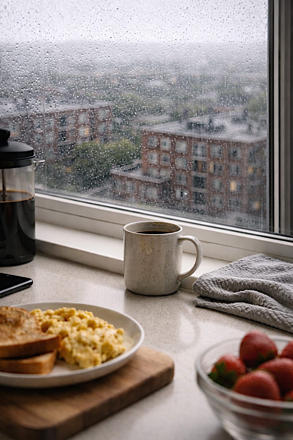 Coffee mug on a table in a modest apartment on a quiet Saturday morning.