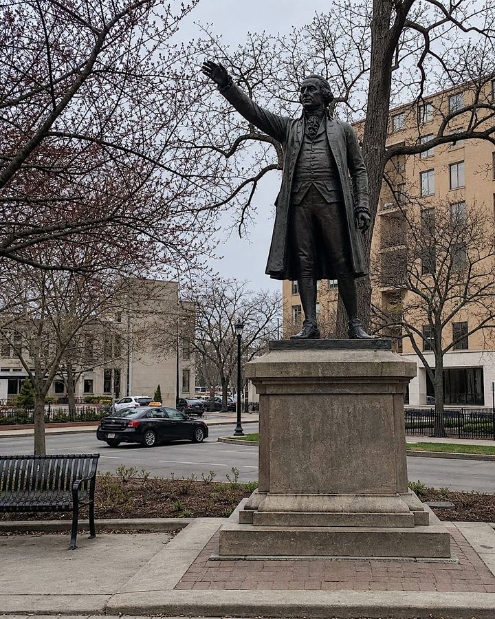 "The statue’s arm was raised in triumph, though historians now believe he was just hailing a cab."