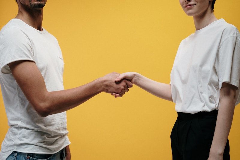 Two people shaking hands