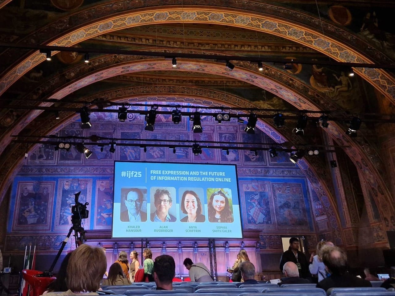 Free expression and the future of information regulation online panel in an old painted church.