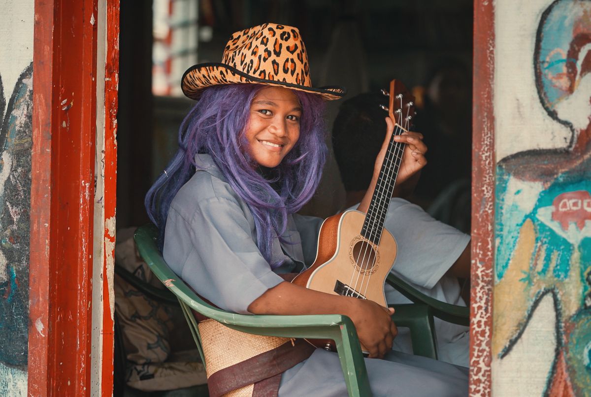 tongan kid learning to playing ukulele